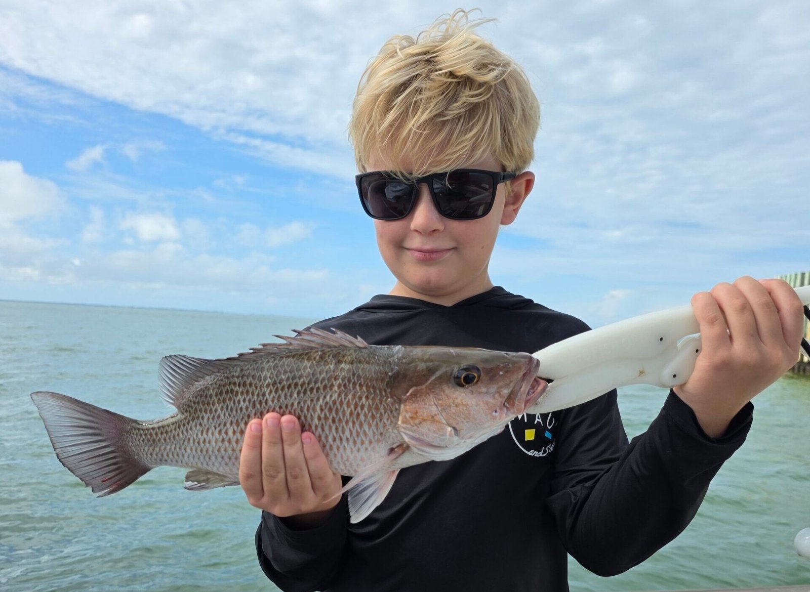 Ben catches a big Tampa Bay mangrove snapper