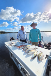 Tampa Bay fishing report October 24 2026 featuring redfish, snook and Spanish mackerel caught on a Salty Scales fishing charter.